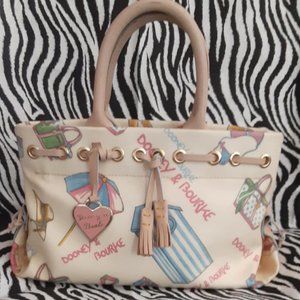 RETIRED IVORY MIAMI DOONEY & BOURKE TASSEL TOTE!